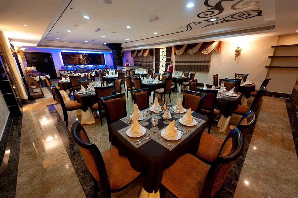 Royal Grand Suite Hotel Schardscha Exterior foto